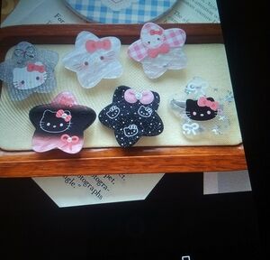 Hello Kitty Star-Shaped Hair Clip Collection - Pink, Black, Silver